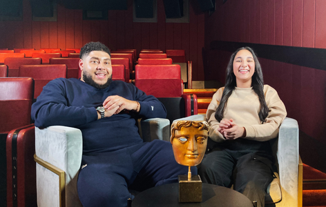TV chef and presenter, Big Zuu, sitting with BAFTA Young Presenter Samaira