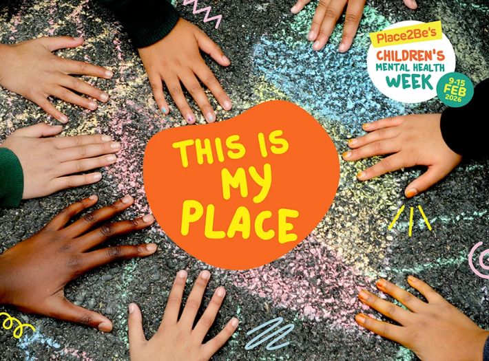 CMHW Theme Full Width Eight children's hands together face down on the playground, with the words 'This is my place' written showing the theme for Children's Mental Health Week 2026.