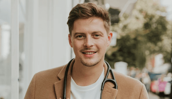 Headshot of Dr Alex George, presenter, author, YouTuber and NHS doctor