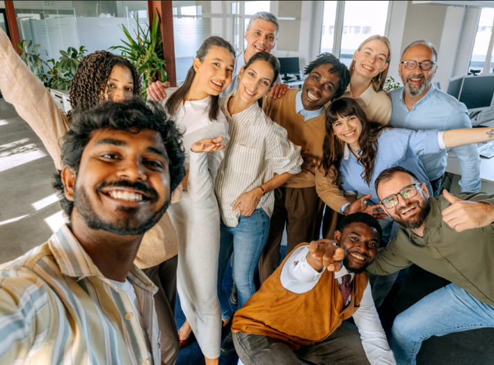 An organisation smiling at the camera