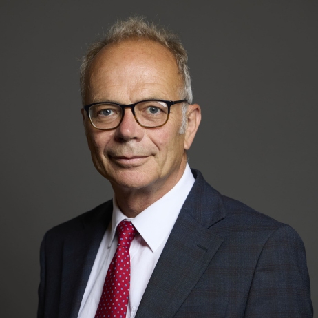 Headshot of Dr Simon Opher MP