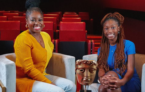 Broadcaster and BBC Radio 1 host, Clara Amfo, sitting with BAFTA Young Presenter Maryam
