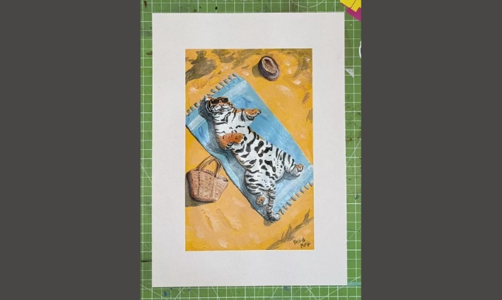 Artwork of a tiger sunbathing with sunglasses on